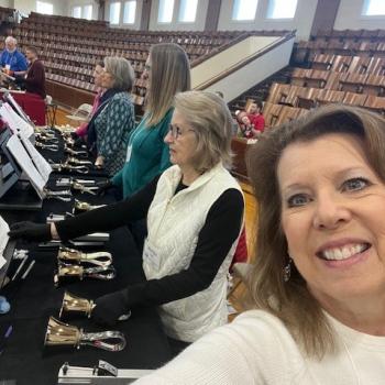 A selfie taken from the end of a row of bell ringers