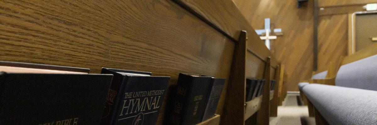 Pews in church sanctuary interior